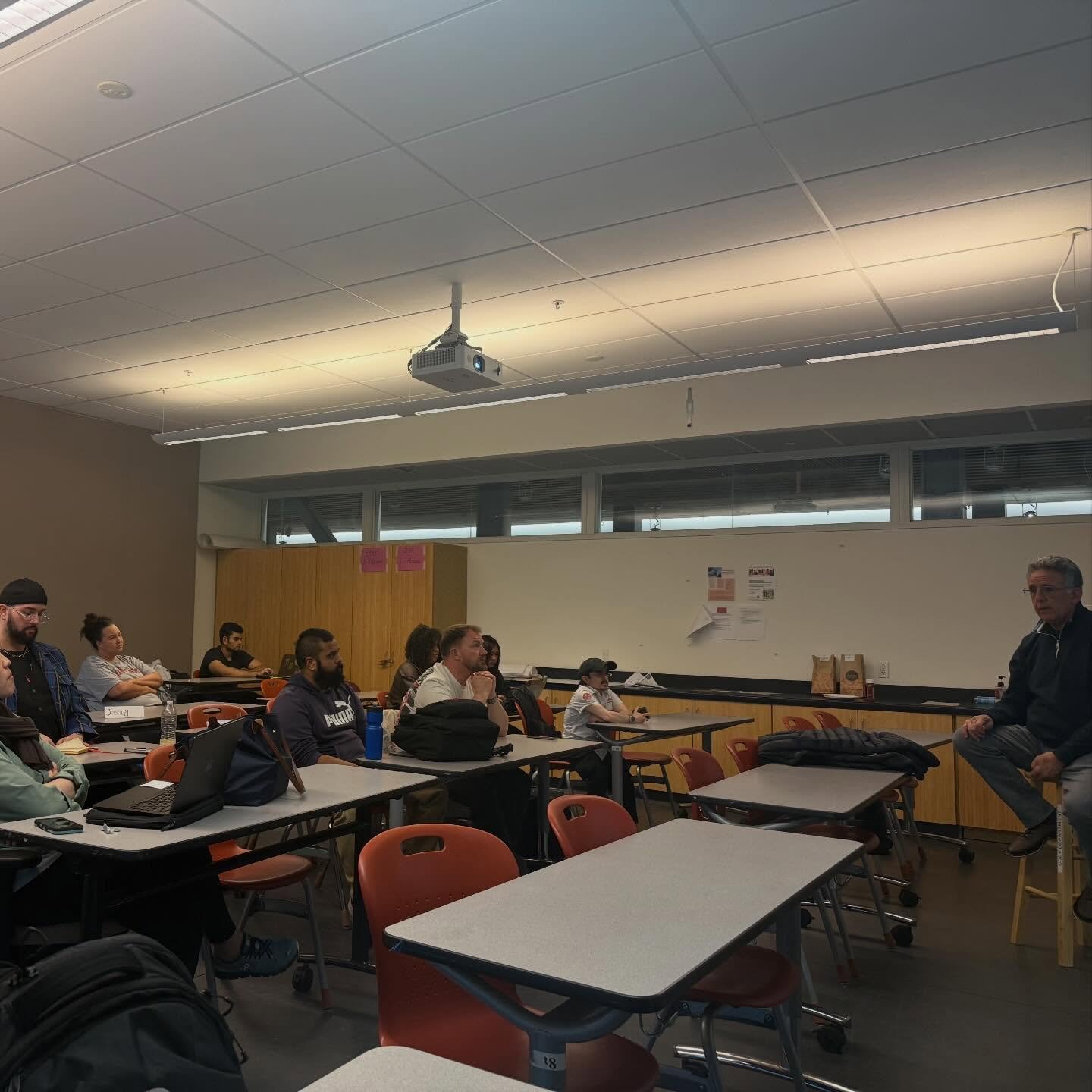 Members listen during Tom Bondi's talk